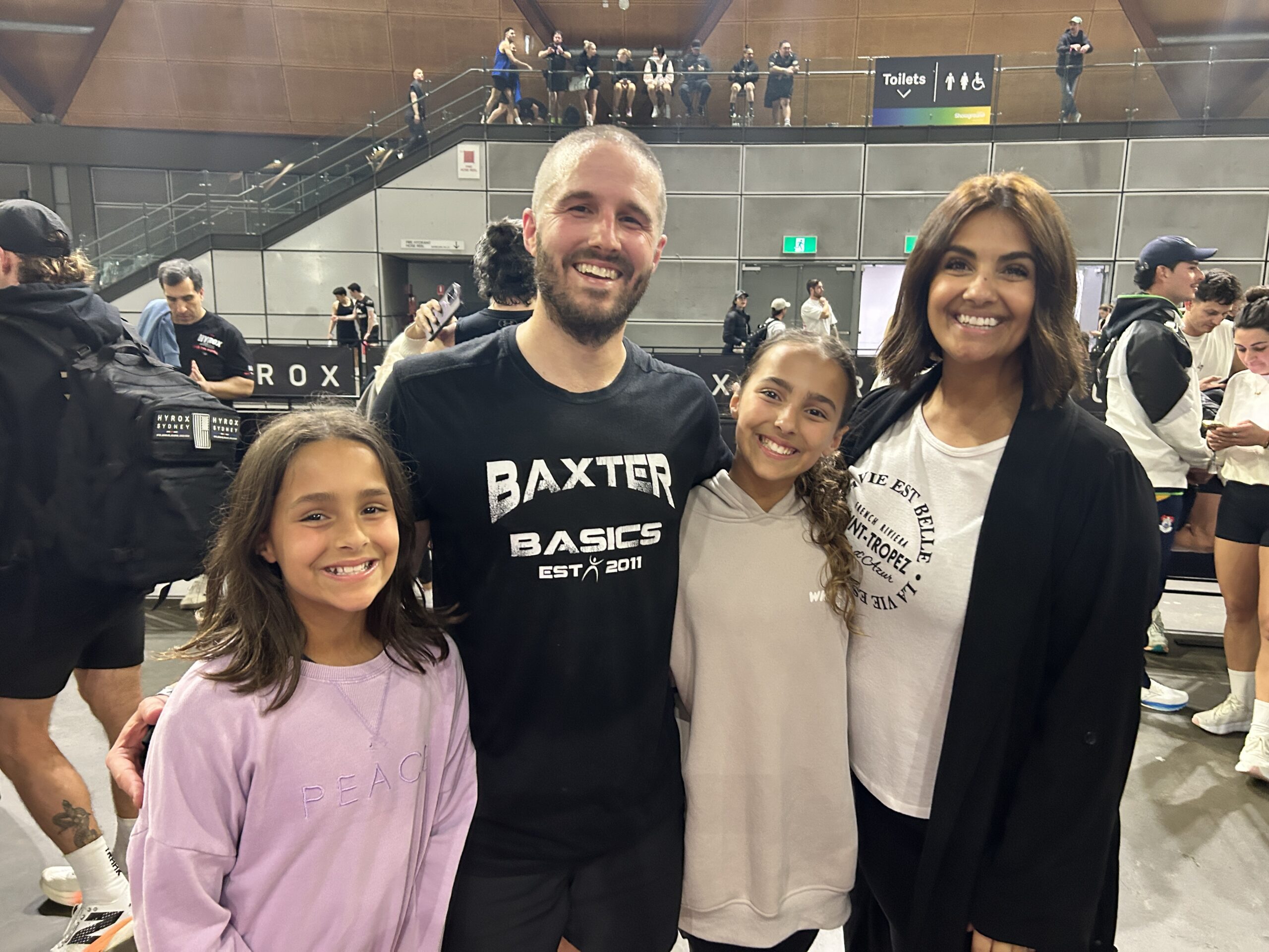 Father smiling, symbolizing strength, energy, and family connection.