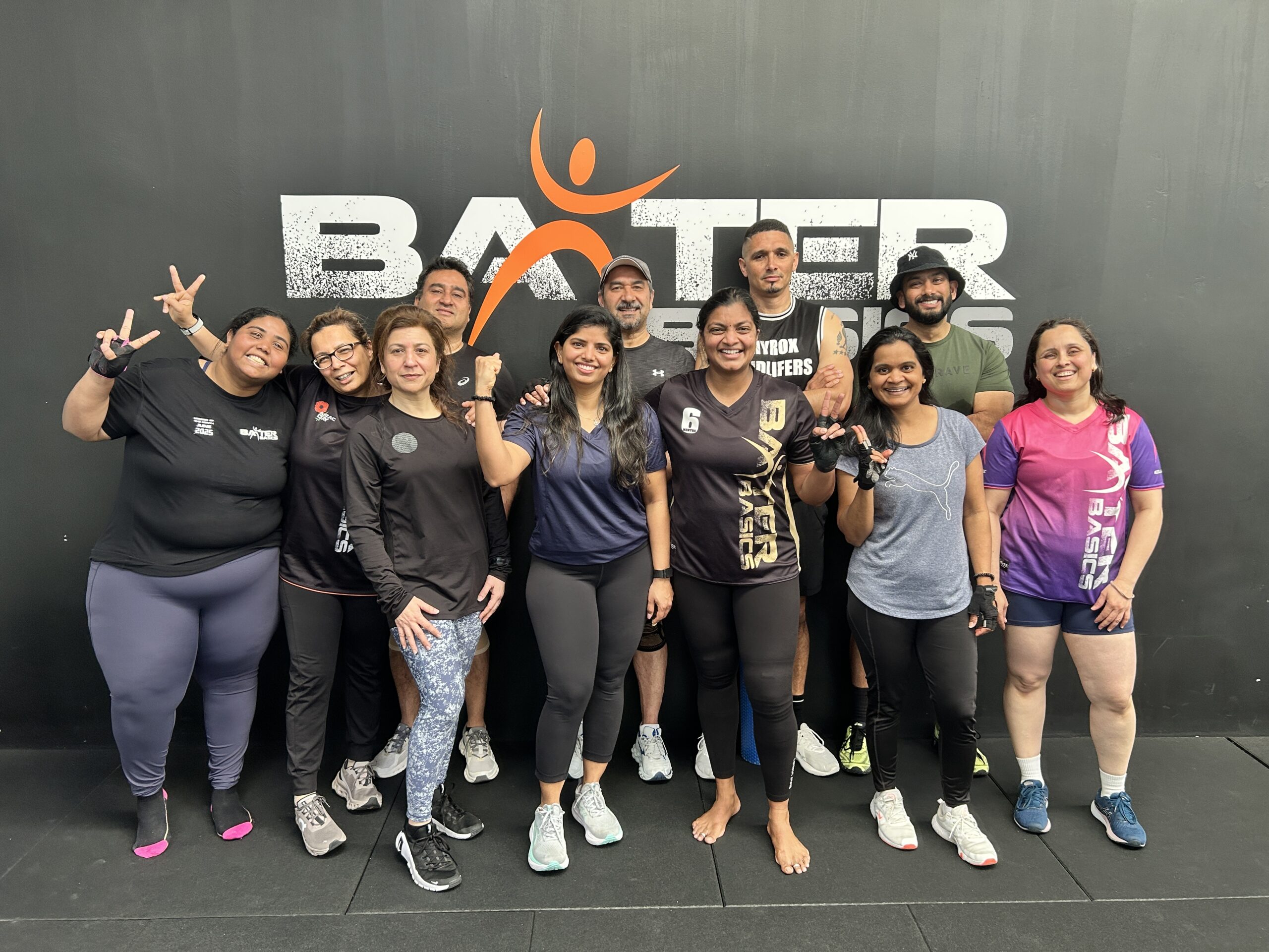 parents training together in a supported fitness session at Baxter Basics gym