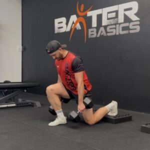 Coach Daz demonstrating fitness for busy parents at Baxter Basics gym