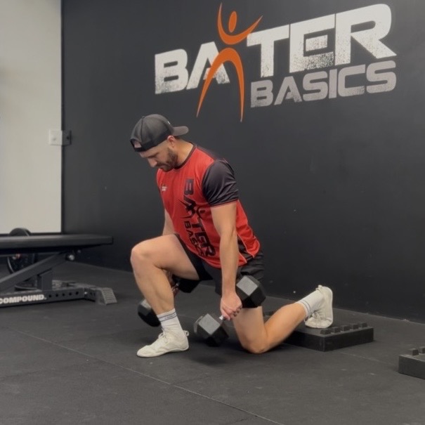 Coach Daz demonstrating fitness for busy parents at Baxter Basics gym